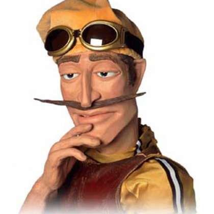 спортакус - в начале одет в коричневый